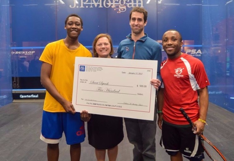 StreetSquash is delighted to receive support from New York Life at the Tournament of Champions. George gladly accepts the check alongside StreetSquashers Jalil '19 and Issey '19.  